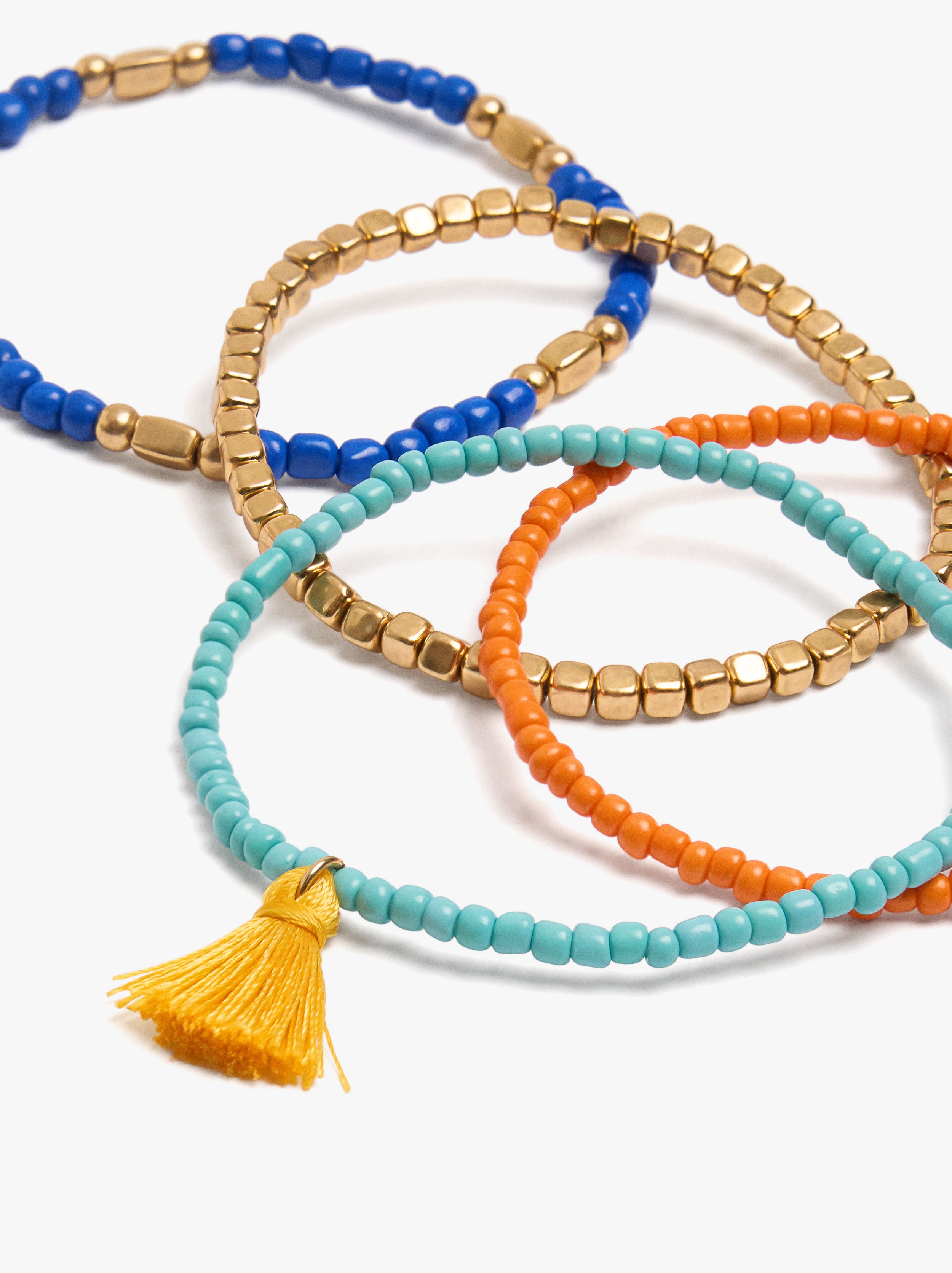 Set De Pulseras Con Abalorios Y Borla