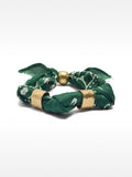 Pulsera De Tejido Con Detalles Metálicos
