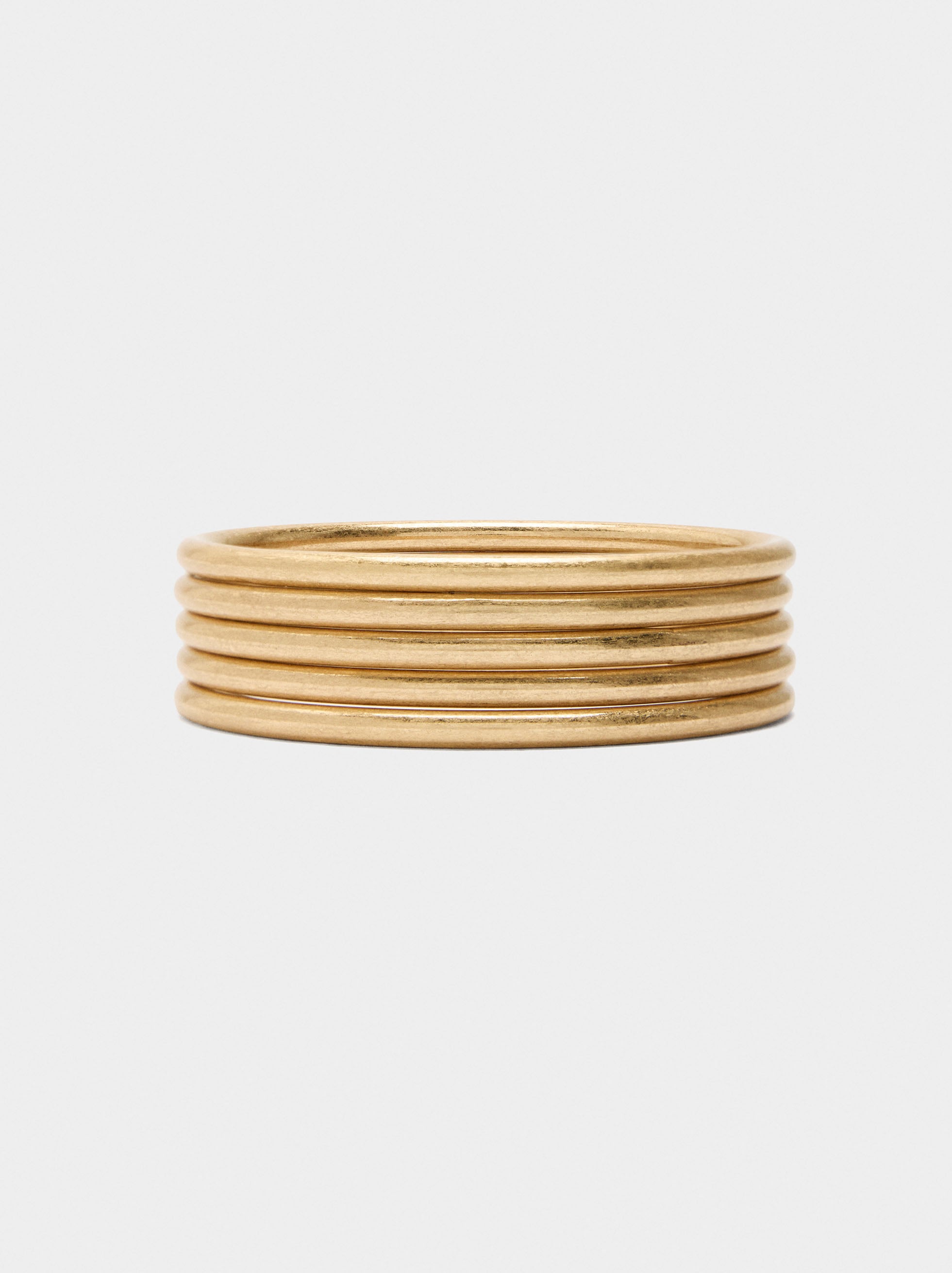 Set De Cinco Pulseras Rígidas Doradas