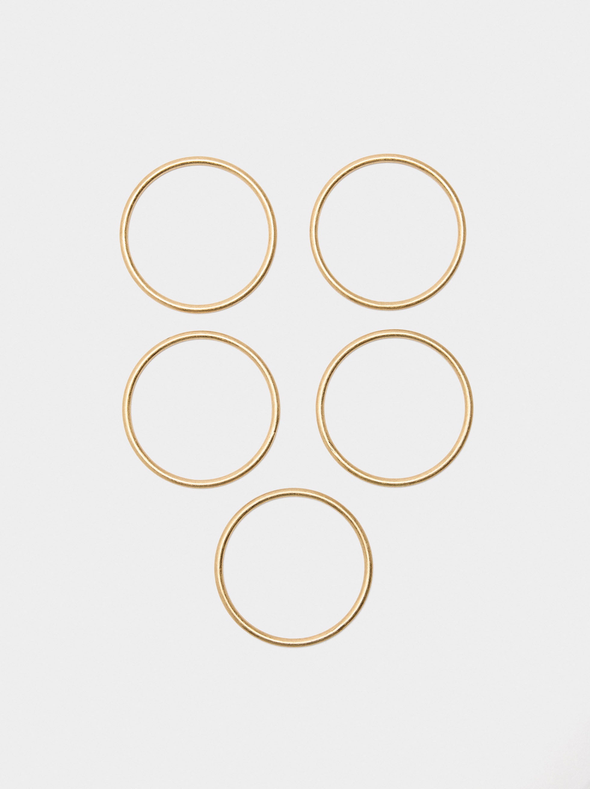 Set De Cinco Pulseras Rígidas Doradas