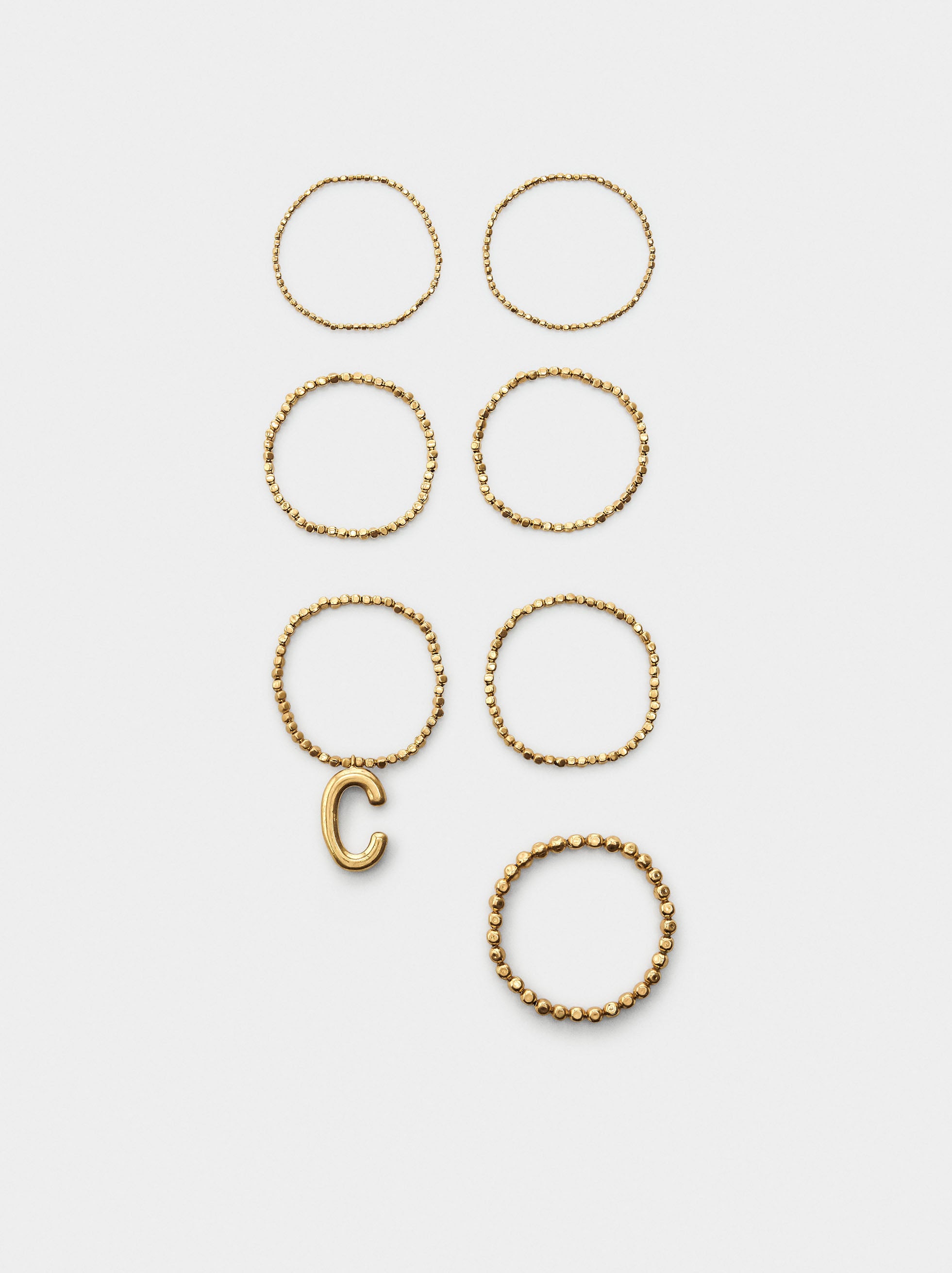 Set De Pulseras Elásticas Doradas
