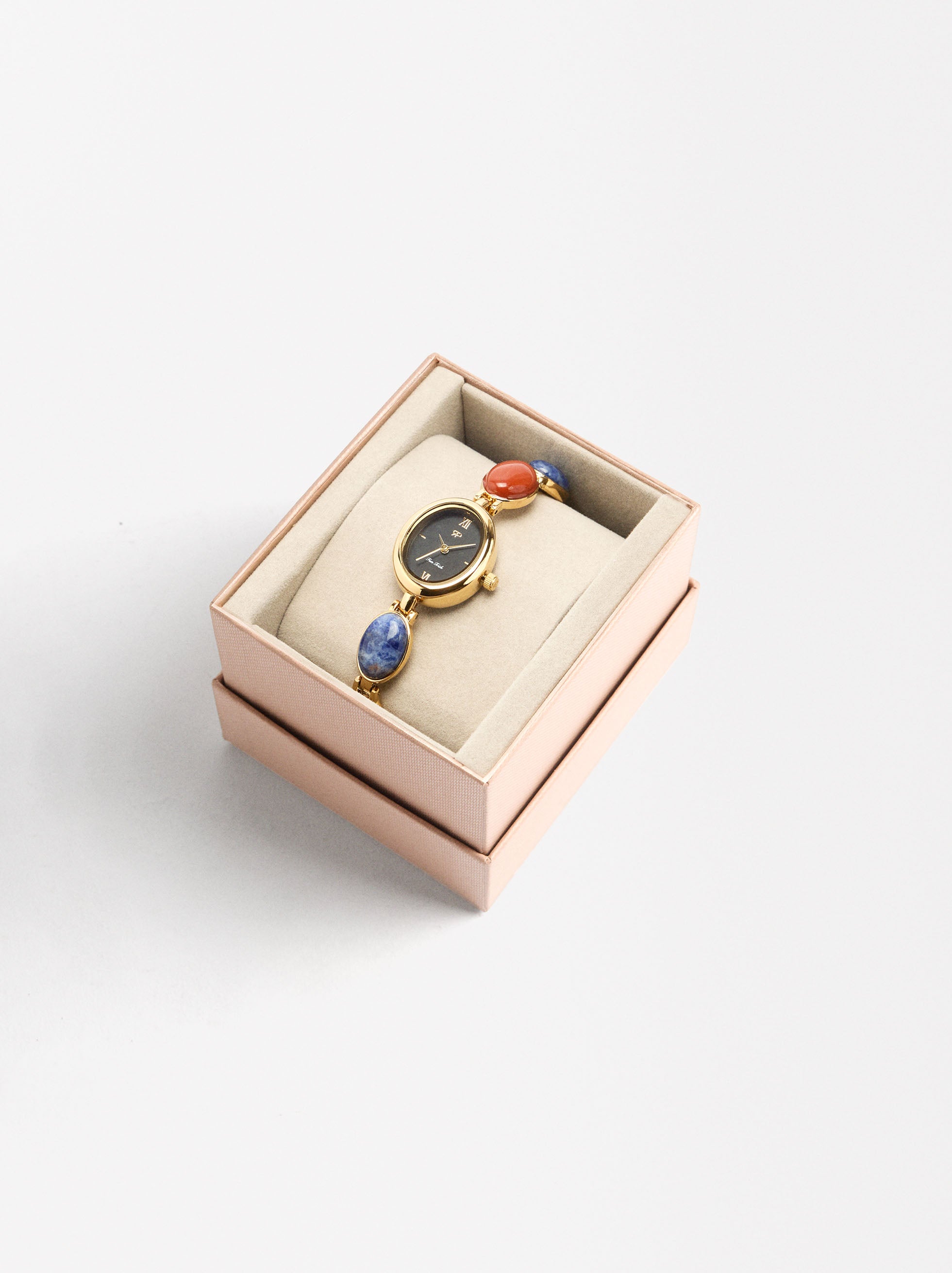 Reloj Ovalado Con Pulsera De Piedras