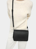 Bolso Bandolera Con Textura Y Cierre De Solapa