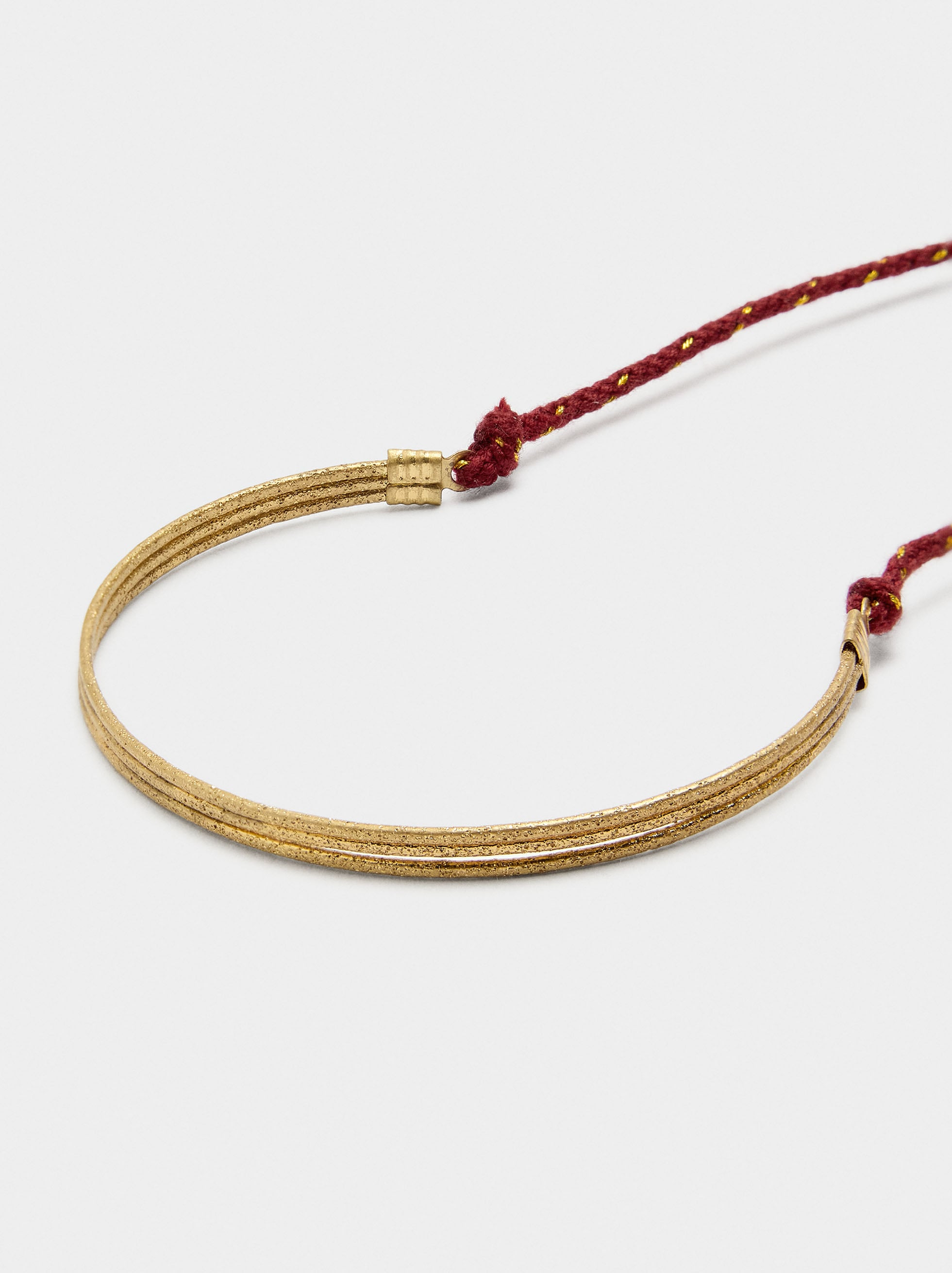 Pulsera Rígida Con Cordón Ajustable